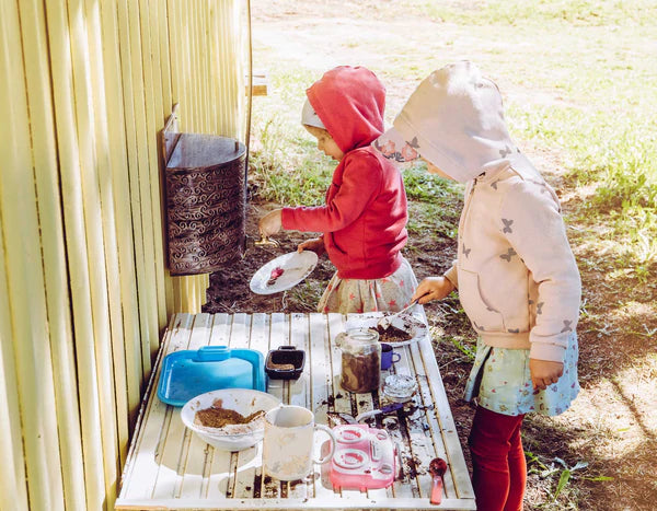 two children playing outdoors butler diaries