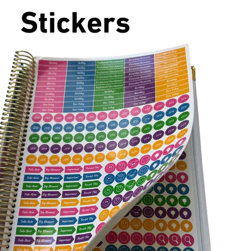 Colorful planner stickers on a spiral-bound notebook with 'Stickers' text above.