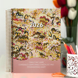 Family Day Care Combined Compliance Checklist and Programming Diary with Desert Sisters Artwork Cover sitting on an FDC Educators desk