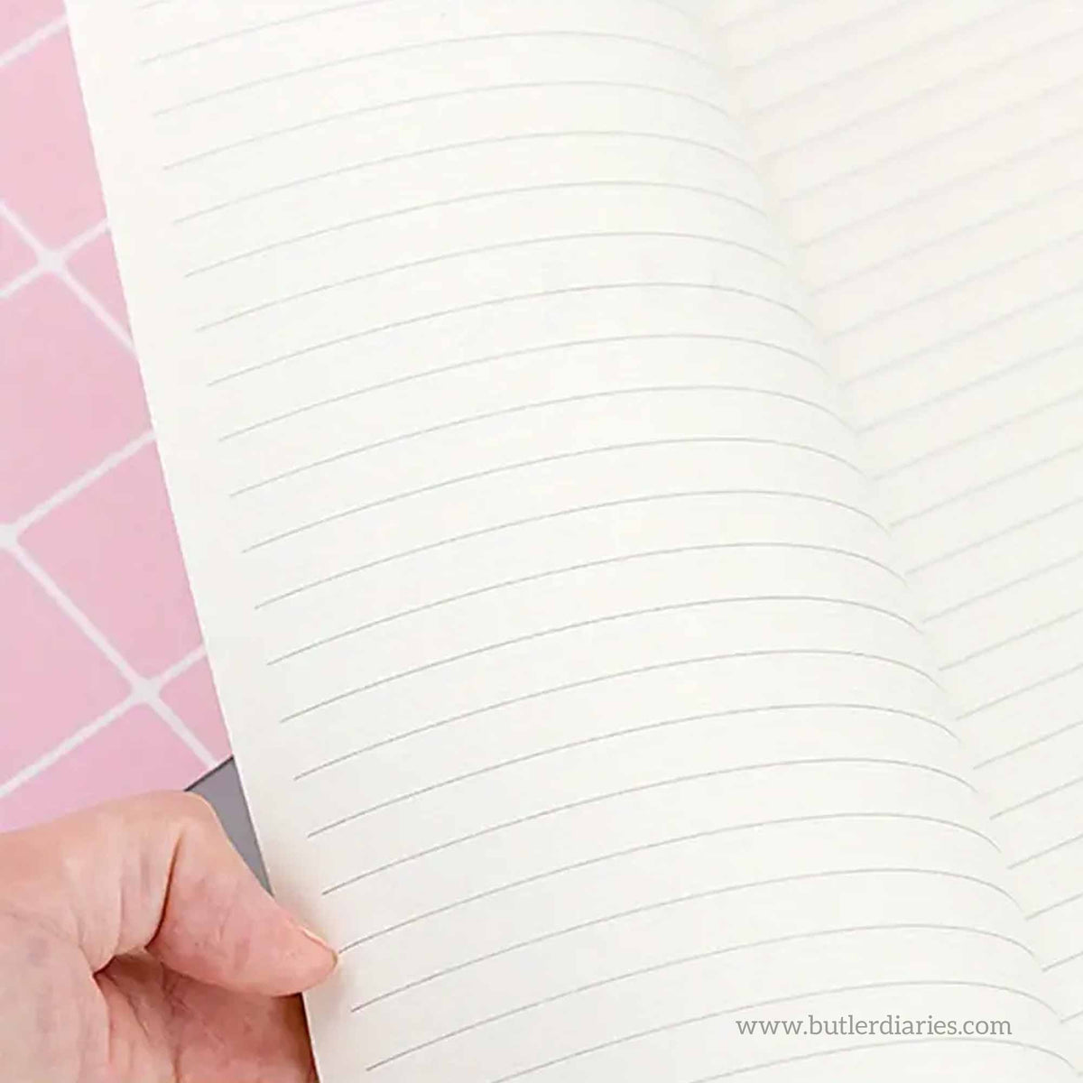 Lined pages inside the Educators Jottings Pad