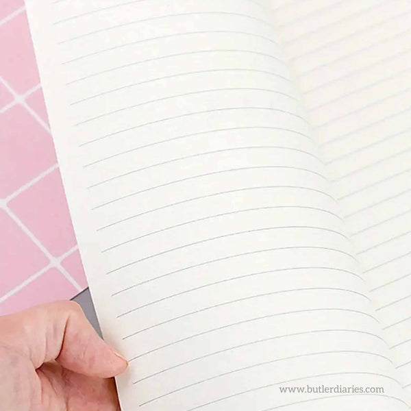 Lined pages inside the Educators Jottings Pad