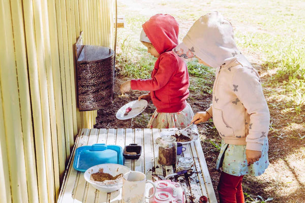 two children playing outdoors butler diaries