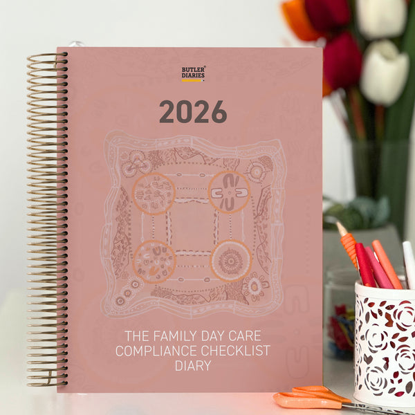 Family Day Care Compliance Checklist Diary with Journey by Learning First Nations Artwork Cover sitting on a FDC educator's desk