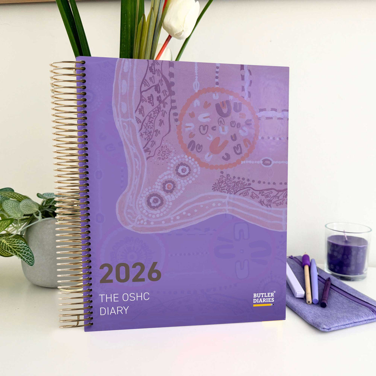 OSHC Diary with Journey of Learning First Nations Artwork Cover sitting on an OSHC office desk