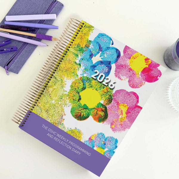The OSHC Weekly Programming and Reflection Diary for MTOP in the Child Artist Cover sitting on an OSHC Educator's desk