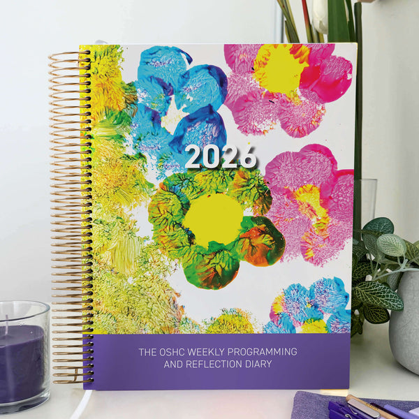 The OSHC Weekly Programming and Reflection Diary for MTOP in the Child Artist Cover sitting on an OSHC office desk