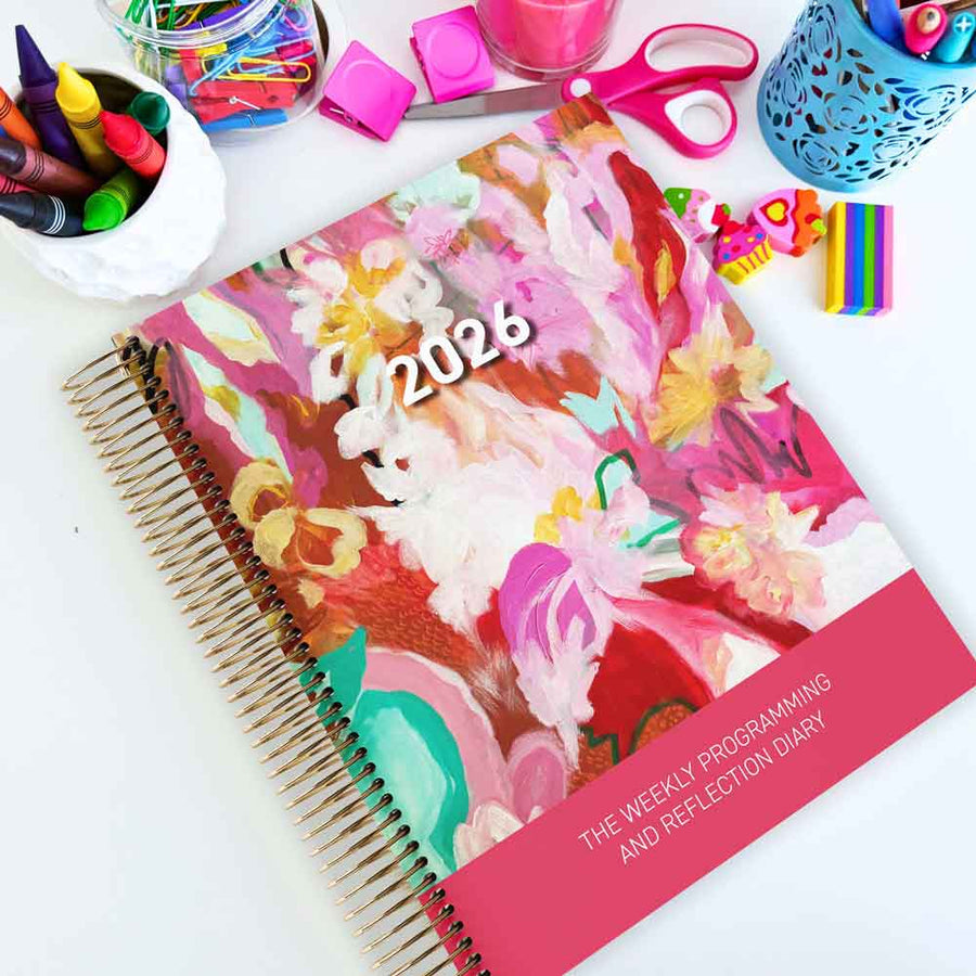 Floral design planner for 2026 with stationery items on a white background