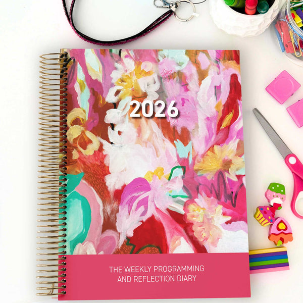 EYLF Weekly Programming and Reflection Diary with Dancing with Pink Artwork Cover sitting on a programming desk for Educators