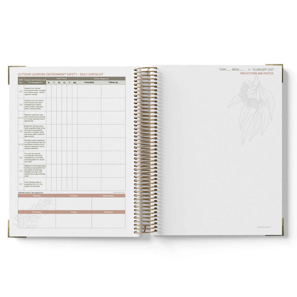 Open planner with a safety checklist on a white background