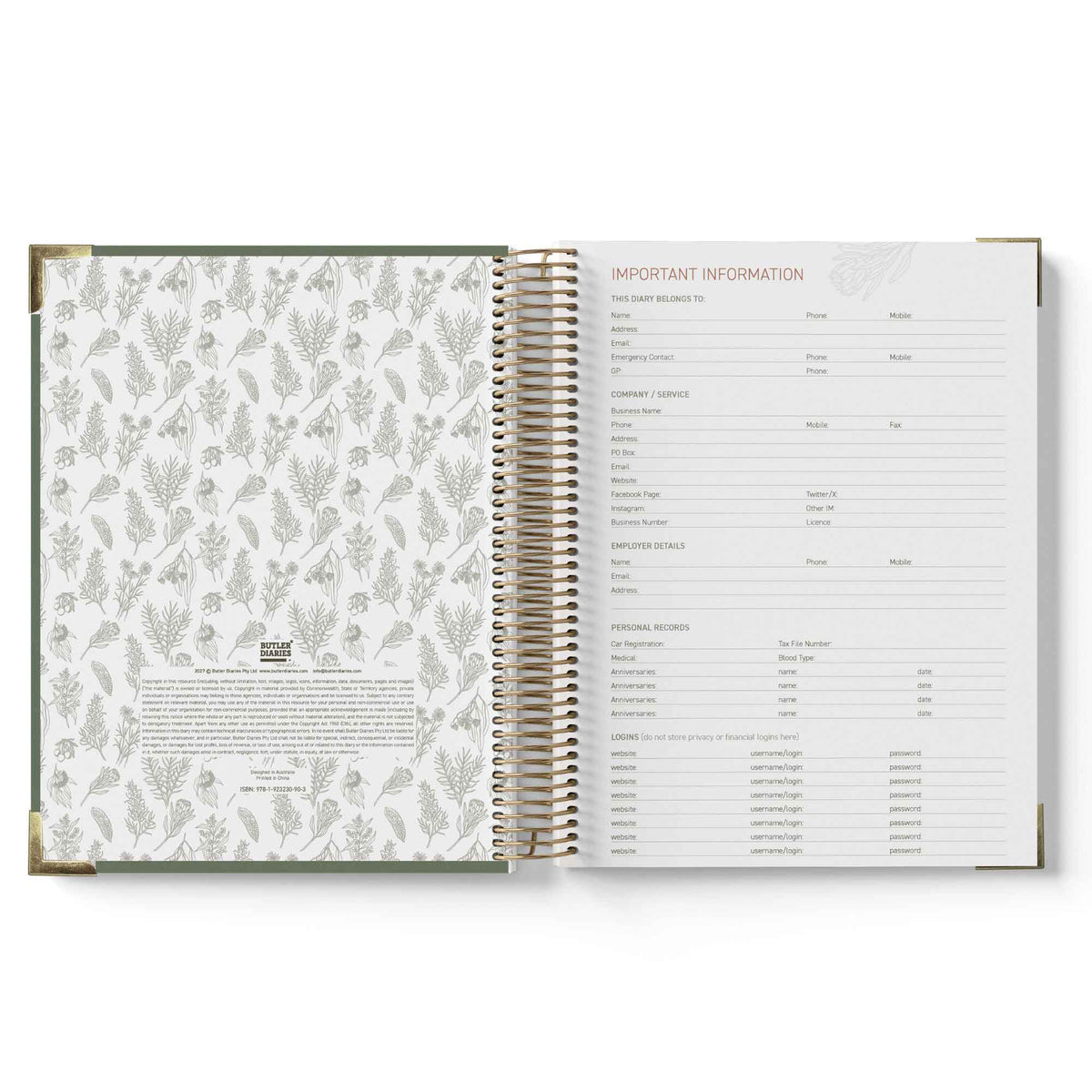 Open spiral-bound book with floral pattern on one page and text on the other, on a white background.