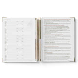 Open book showing pages with text on a white background