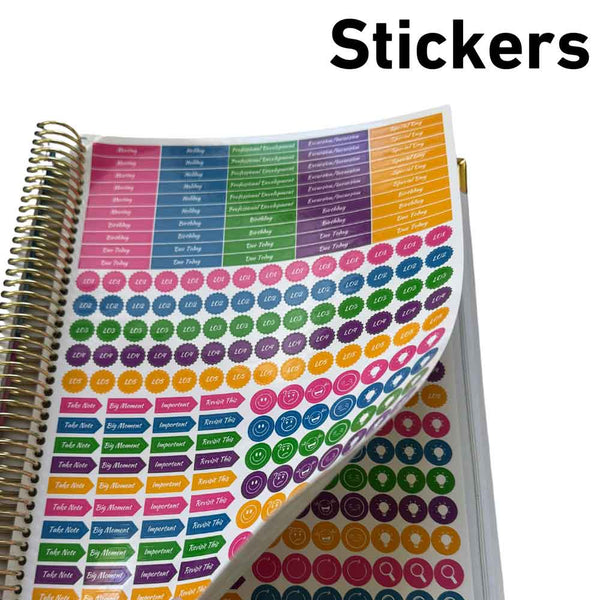 Colorful planner stickers on a spiral-bound notebook with 'Stickers' text above.
