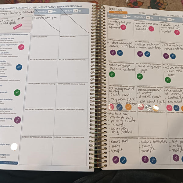 Open programming spread showing clear links to frameworks using stickers