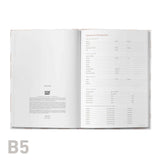Open book with text on a white background