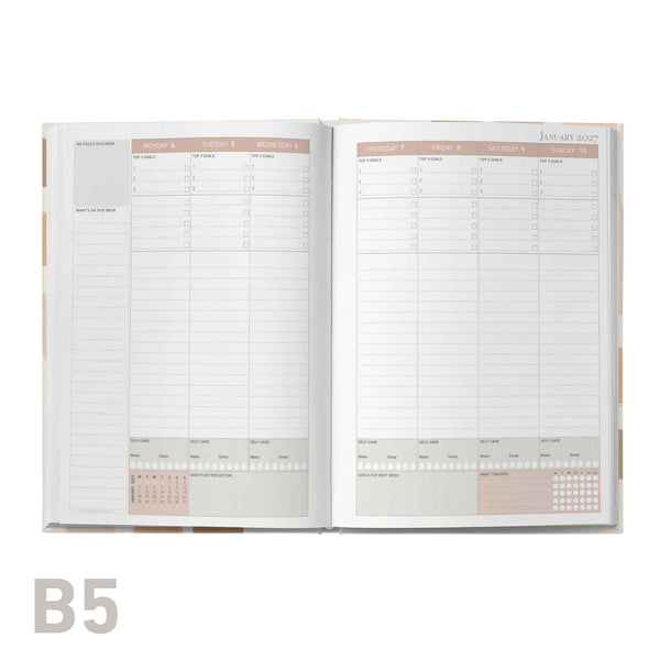 Open educator planner showing monthly calendar layout with 'B5' size label at the bottom.