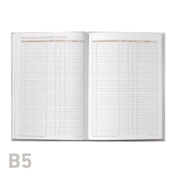 Open professional development log book with grid pages on a white background