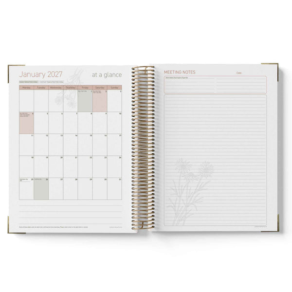 Open spiral-bound 2027 Educational Leader Diary showing January 2027 calendar and meeting notes pages on a white background.