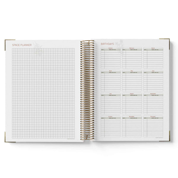 Open spiral-bound 2027 Educational Leader Diary with grid and list pages on a white background