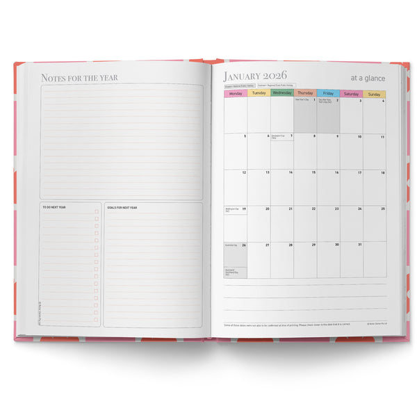 Open planner showing a monthly calendar and notes section on a white background