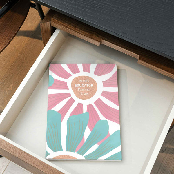 2023 Educator Planner Diary with sunburst design in a wooden drawer
