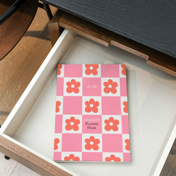 Floral patterned notebook in an open drawer