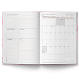 Open planner showing January 2026 calendar and notes section on a white background