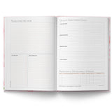 Open planner with sections for 'Notes for the Year', 'Quality Improvement Goals', and 'Professional Development Summary'.