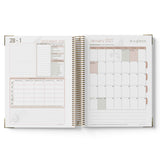 Open planner showing calendar pages from December 2026 to January 2027 on a white background.