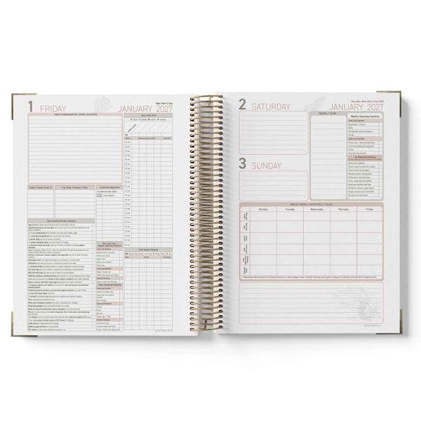 Open daily planner with January 2023 dates on a white background