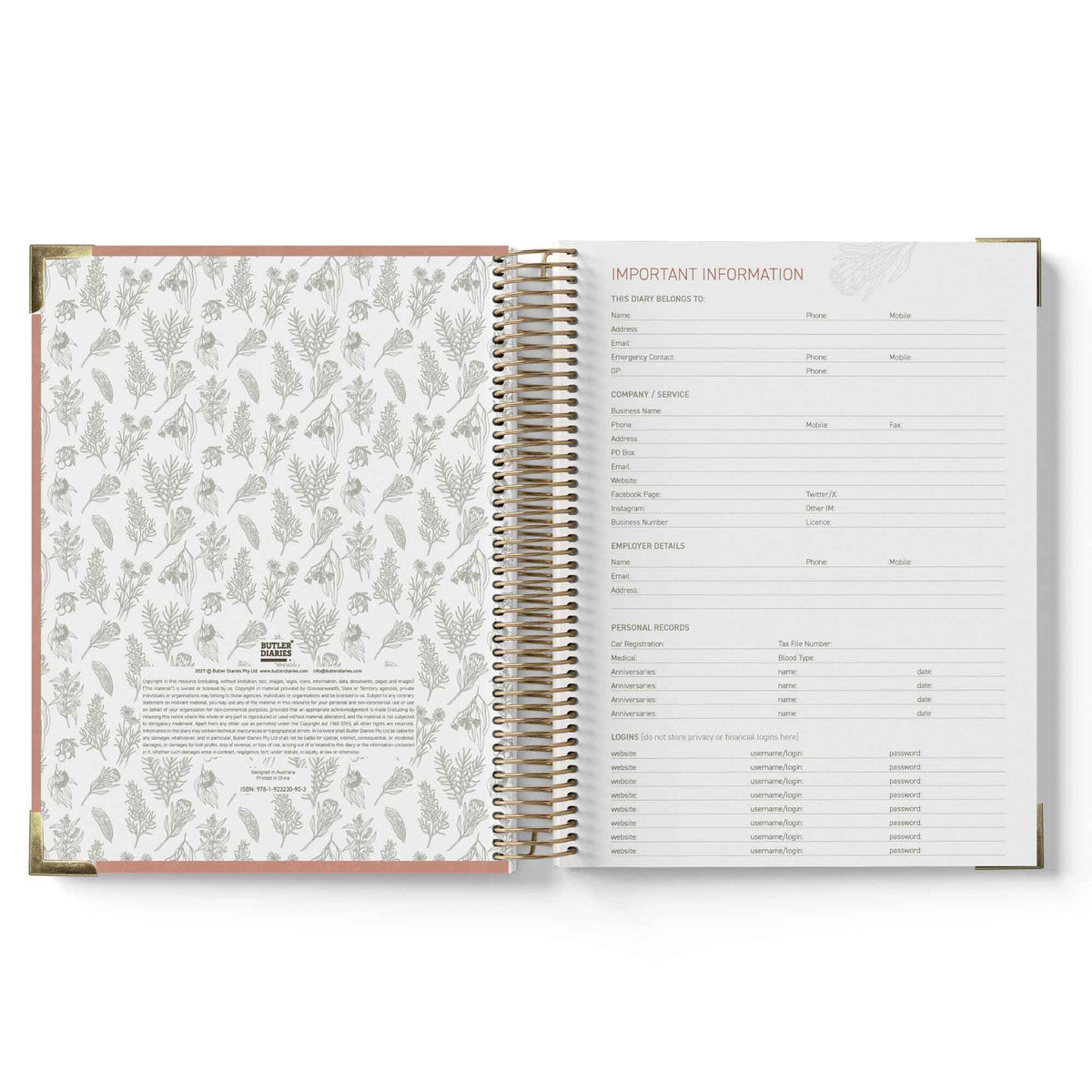 Open spiral-bound planner with floral pattern on left page and text on right page.