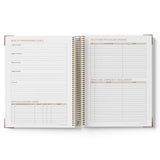 Open 2027 Family Day Care Checklist Diary with sections for quality improvement goals, policy and procedure reviews, and family and community involvement on a white background.