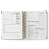 Open daily 2027 Family Day Care Checklist Diary with calendar and notes sections on a white background