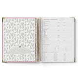 Open 2027 Family Day Care Checklist Diary with floral design on one page and text on the other, on a white background.