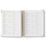 Open 2027 Family Day Care Checklist Diary with a list of names on each page, on a white background