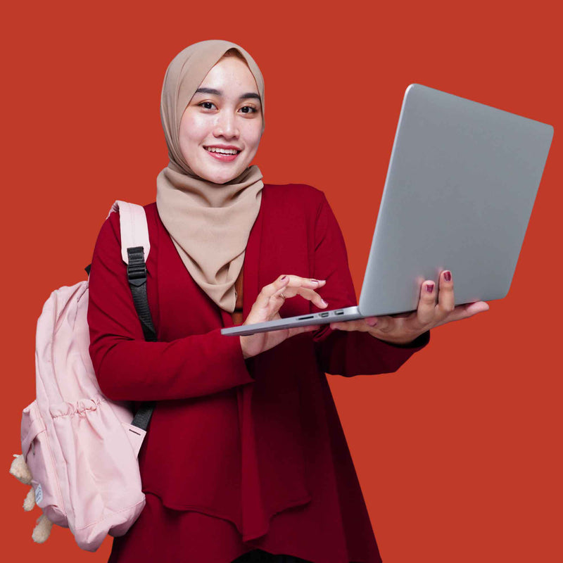 Woman holding a laptop with a pink backpack on a red background