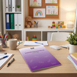 Purple immunisation register book on a desk with stationery and toys in the background