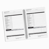 Open notebook with incident response record pages on a white background