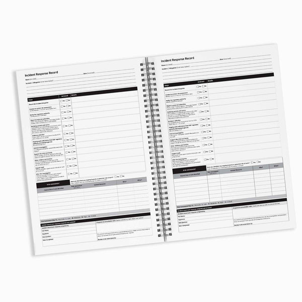 Open notebook with incident response record pages on a white background