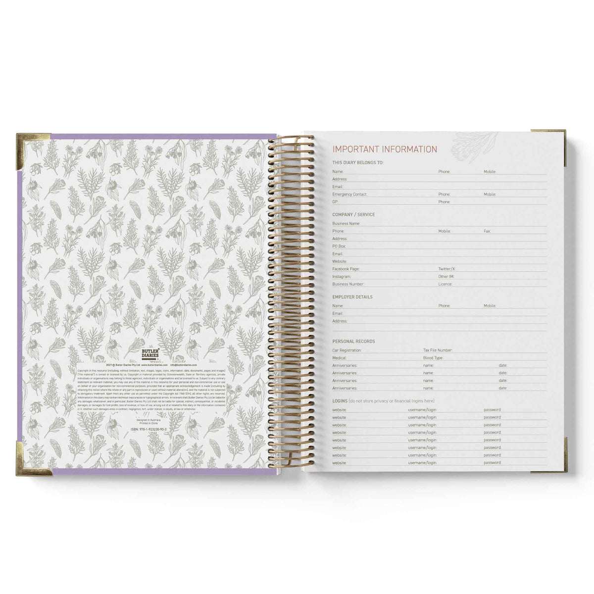 Open spiral-bound planner with floral pattern on one page and text on the other, on a white background.