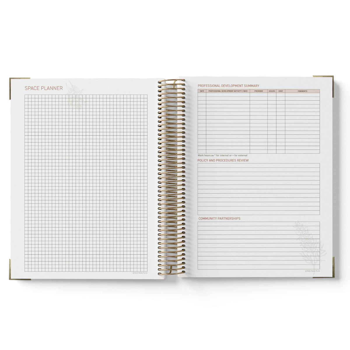 Open spiral-bound planner with grid and lined pages on a white background