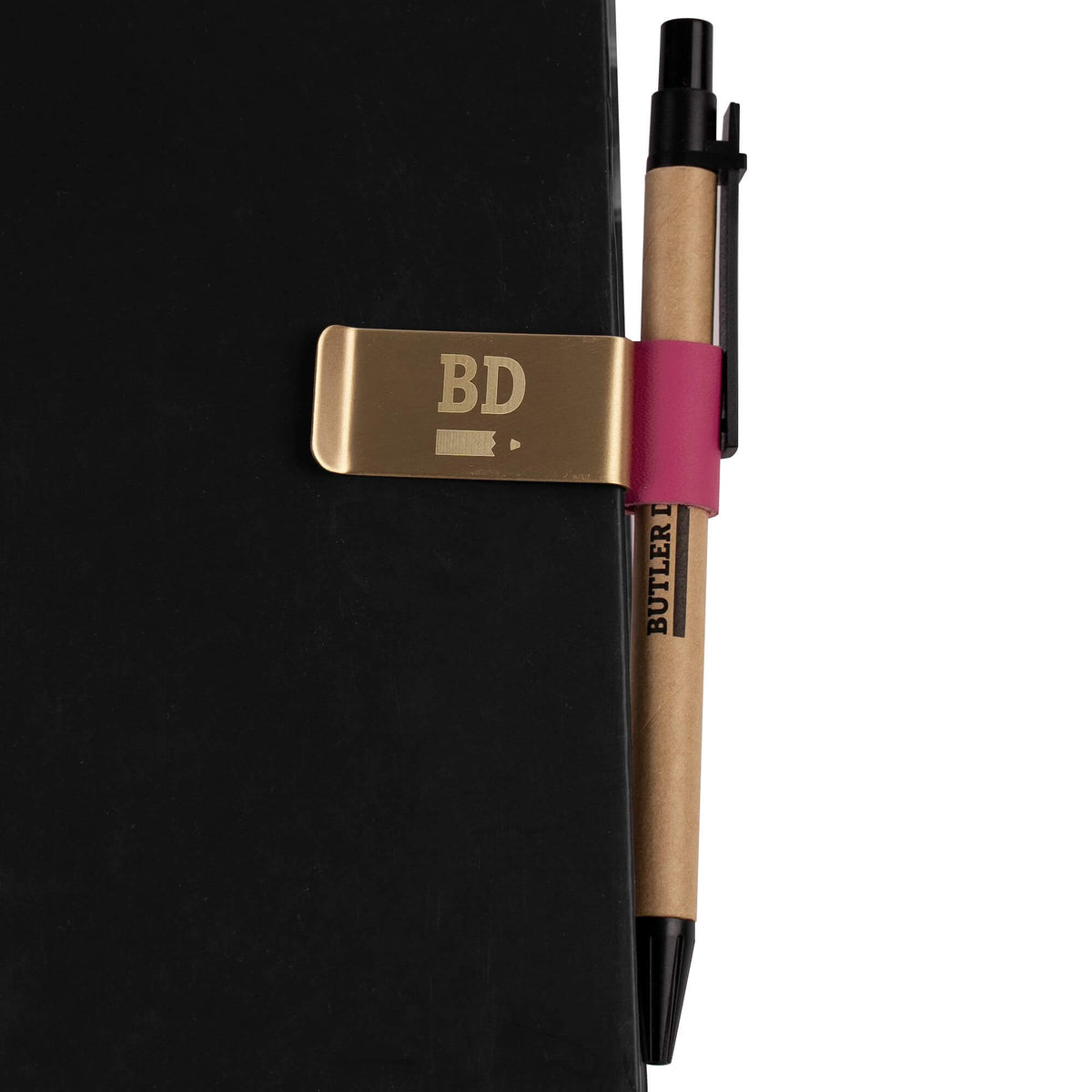 How the Educator Pen Clip in dark pink looks when clipped to your Diary