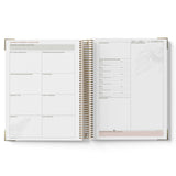 Open QLD Kindy Programming Diary with white reflection pages on a white background