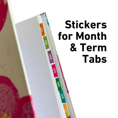 Notebook with colorful month and term tabs on a white background