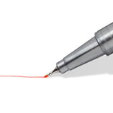 red pen with a red line on a white background