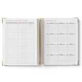 Open teacher planner showing detailed pages on a white background