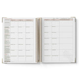Open 2027 ECEC Programming Diary showing weekly and daily schedules on white background