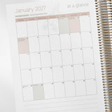 Calendar page for January 2027 with a spiral-bound 2027 ECEC Programming Diary on a white background