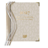 2027 weekly programming and reflection diary with beige cover and gold text on a white background