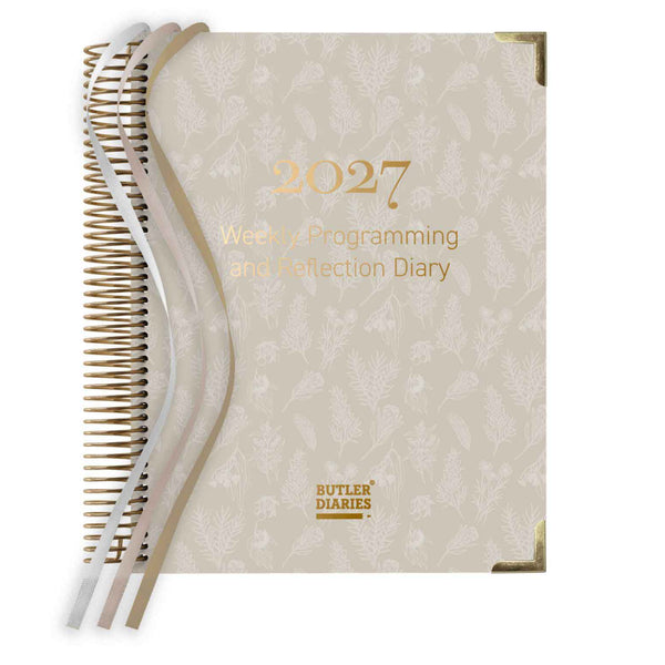2027 weekly programming and reflection diary with beige cover and gold text on a white background