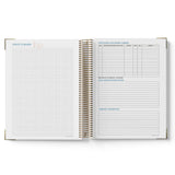 Open spiral-bound 2027 ECEC Programming Diary with grid and lined pages on a white background